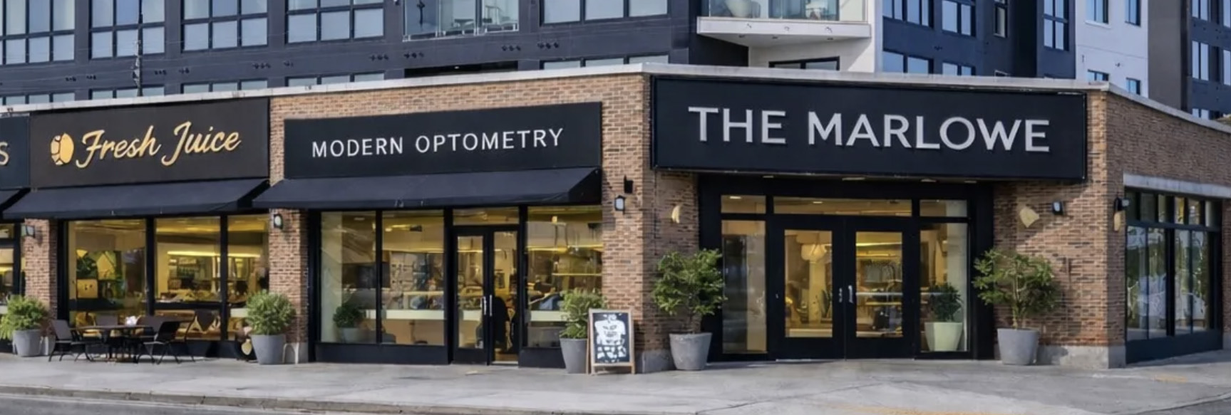 Ground-floor retail with Fresh Juice, Modern Optometry, and The Marlowe lobby entrance